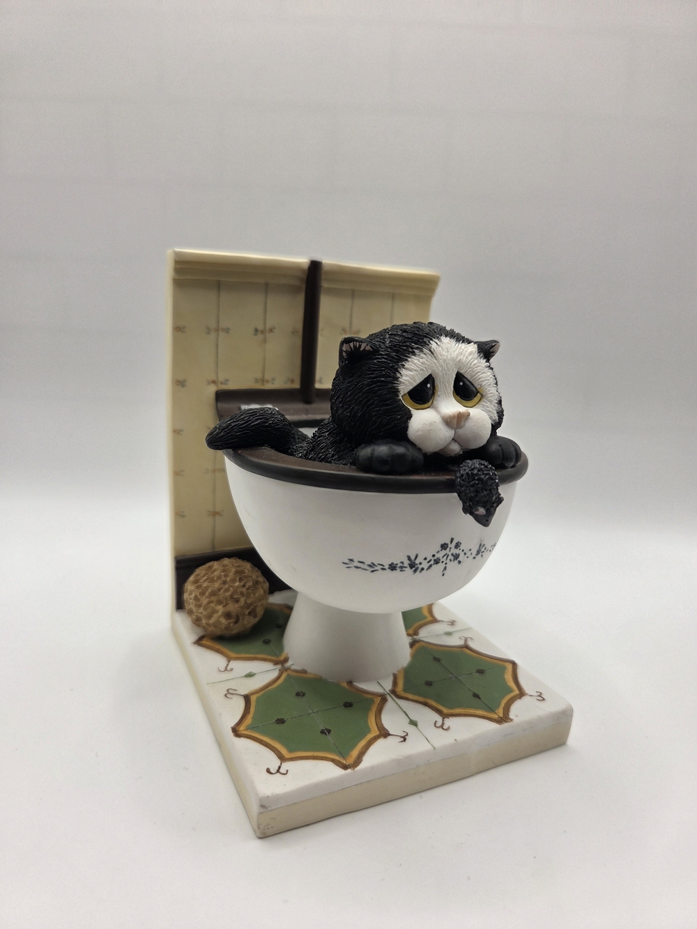 R200. Down The Pan Black and White Cat in Toilet Figurine